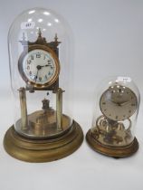 Two Brass based Anniversary clocks, Both non runners for spares or repairs. Largest under glass dome