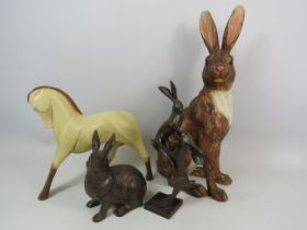 4 Modern resin and plaster sculptures of Rabbits and a horse.