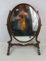 Mahogany tilting table top mirror which measures approx 23 x 16 inches. See photos.