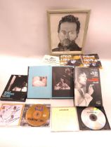Selection of Autographed Pop Memorabilia to include a Signed Framed and mounted Eric Clapton Photo, 