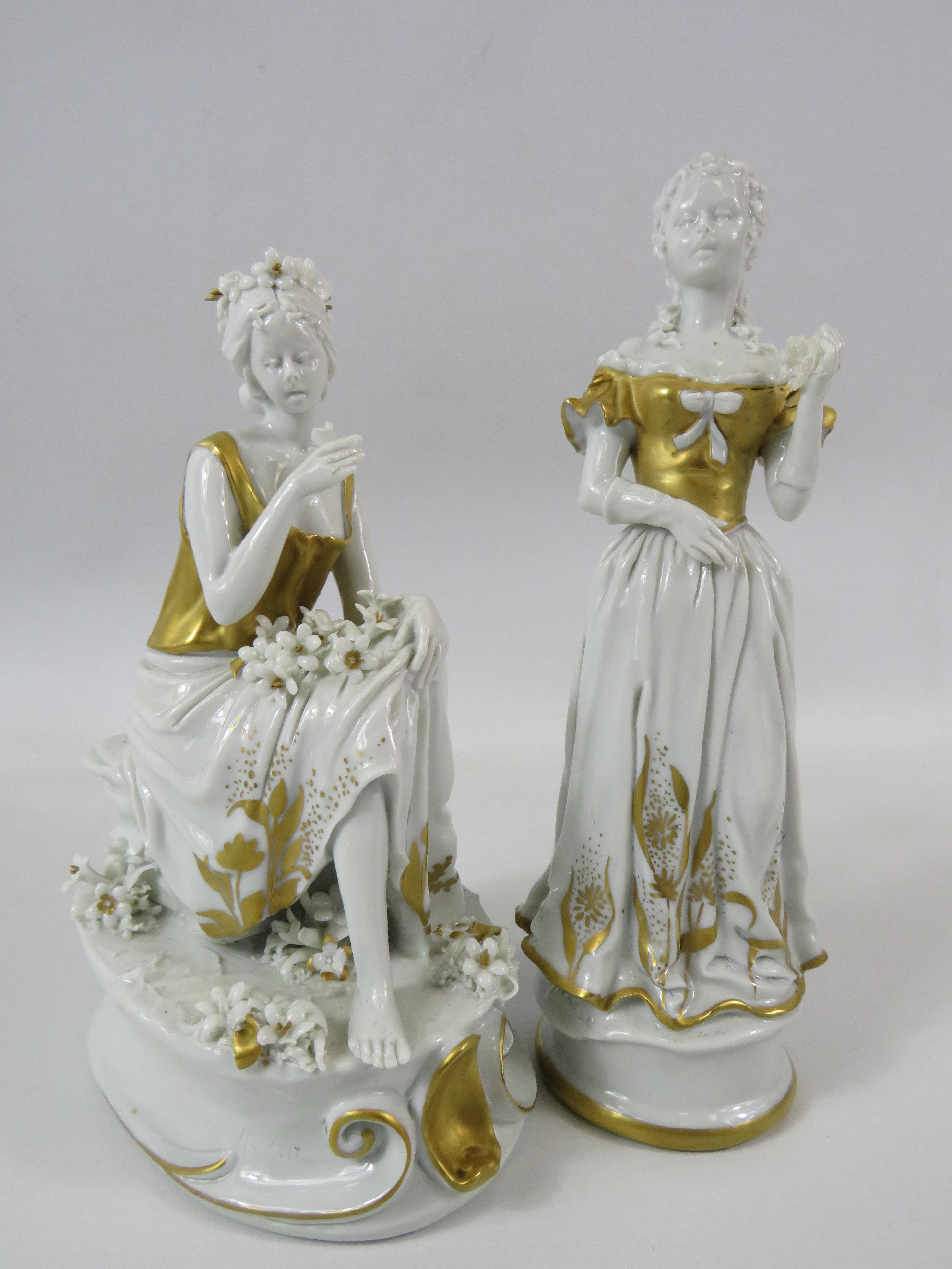 2 Signed Capodimonte white and gold porcelain figurines, the tallest measures 22cm.