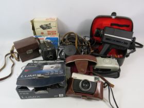 Photography lot vintage cameras and camcorder plus a boxed modern camera see photos for makers.