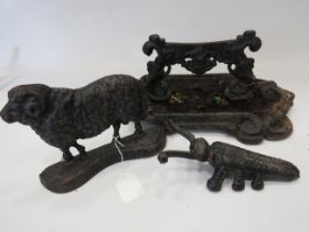 Mixed lot to include a Vintage Iron Boot Scraper, An Insect Boot remover plus a Sheep door stop. See