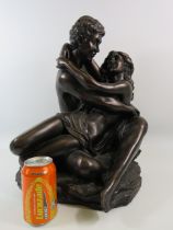 Large bronze effect resin sculpture of Lovers embracing, approx 47.5cm tall.