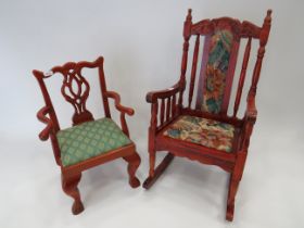 Two Dolls Rocking chairs, one measures Approx 19 inches tall, the other approx 14 inches. See photo