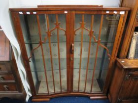 Convex fronted glass display cabinet with Oak frame. Measures approx H:49 x W:41 x D:13 inches. See