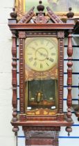 Oak Wall Clock with nicely carved case and mirror back, no key . Non runner for spares or repairs. A