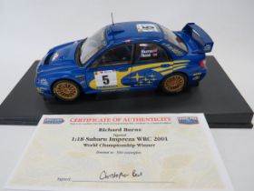 Auto Art 1:18 Scale Die Cast Model of a Subaru Impreza 2001 WRC World Champion Winner. Housed under