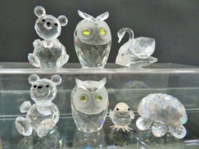 Seven Swarovski Crystal animals, largest approx 3 inches tall. All come with original cylinder boxes