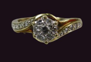9ct gold and Diamond ring, Central diamond with 6 surrounding and 4 to each shoulder, Size O.5. 3.