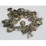 Sterling silver Charm bracelet with padlock and 21 charms total weight 71g