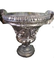 Large Stone Garden Urn in a mettalic style finish. Weather worn condition. Measures approx H:21 x W: