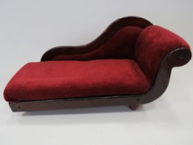 Dolls Chaise Lounge which measures approx 18 inches long and 10 inches tall. Dark wood frame and in