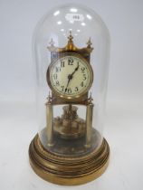 Gustav Becker Brass based Anniversary Clock under a Glass dome. Running order but no key present. Me