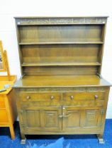 Dark Oak Dresser by Webber from the 'Croydon' Range. Plate rack above, nice carved detail to doors