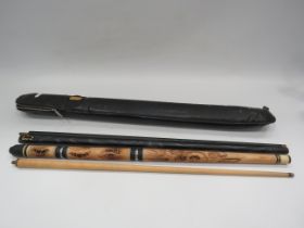 Two 2 piece snooker cues and a case.