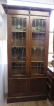 Large Oak Bookcase with cabinet under and Lovely stained glass doors above. Stands approx H:78 x W:3