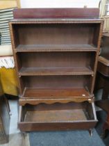 Darkwood bookcase with magazine rack below. Measures approx H:44 x W:30 x D:12 inches. See photos.