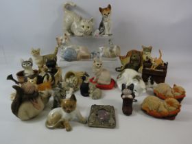 A large selection of various cat figurines some by Leonardo and Sherrat and Simpson.