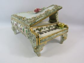 Large Capodimonte grand piano, approx 25cm tall, 26cm wide and 38cm long glued repair to one leg.