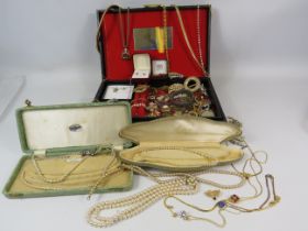 Jewellery box and costume jewellery contents necklaces, brooches etc.