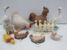 Various Duck and Chicken figures and wall plaques.