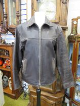 Small vintage british made mens brown leather jacket.