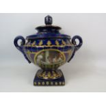 Large Royal Limoge blue and gold twin handle lidded urn vase with panels dipicting girls on a