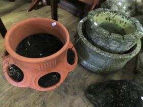 Two Stone and one Terracotta Garden Planters. (These items are heavy and not suitable for postage.