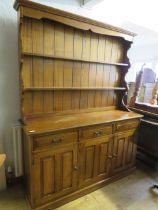 Large Oak Dresser with plate rack above. Measures approx H:77 x W:60 x D:18 Inches. See photos.