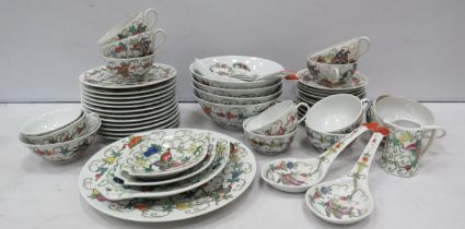 Oriental tea and rice china set decorated with butterflies.