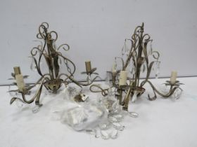 Two modern 3 arm bronze effect chandeliers.