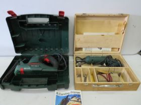 Bosche Multi saw in original box plus a Bosche Carving primer with tools and box. See photos.