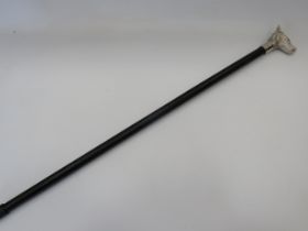 Composite material Walking Cane with White Metal Wolf's Head Handle. Measures approx 37 inches long