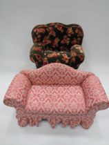 Two Dolls settees, one stands approx 12 x 16 inches in wood frame, one in a soft fabric material.