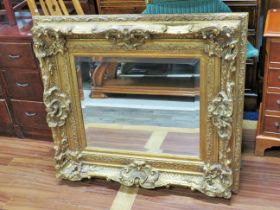 Lovely large Gesso framed bevelled glass mirror . Can be hung as panoramic or Transverse. Measures 5