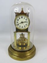 Gustav Becker Brass based Anniversary Clock under a Glass dome. Running order but no key present. Me