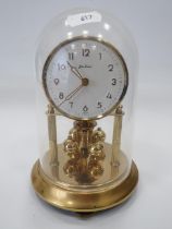 German Made Bentima Brass Based Anniversary Clock with adjustable feet under perspex dome. Measures