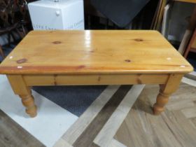 Attractive Studily built low pine table on chunky turned legs. H:20 x W:48 x D:26 Inches. See photo