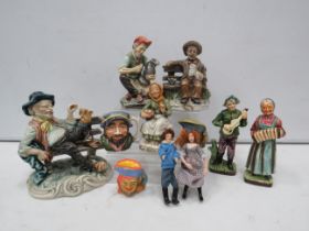 Selection of Capodimonte style figurines, 2 small porcelain dolls etc.