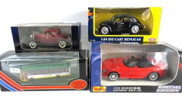 Four Die Cast model vehicles by Maisto, Sunnyside, Motomax. All boxed and unused.