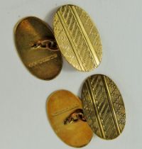 Pair of 9ct Yellow Gold Cufflinks with machined decorations, each inscribed (Jeff) Total weight 2.8