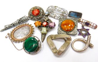 Twelve Sterling Silver Brooches, some stone set. See photos.