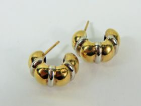 Pair of Yellow and White Gold half loop lobe earrings. (no fasteners) 18mm wide. Total Weight 3.4g