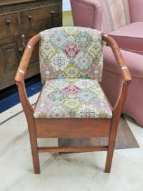 Oak Made Commode tub chair with needlepoint upholstery . Excellent condition. See photos.