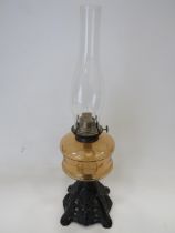 Pretty Metal and glass Oil Lamp with Pierced metal base and Unranium glass reservoir with clear glas