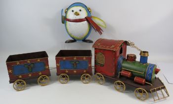 Tin metal christmas train with carriages (80cm long) and a penguin (25cm tall)