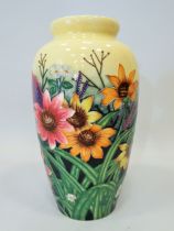 Pretty Old Tupton Ware Tubelined vase depicting Spring flowers which measures 11 inches tall. Excell