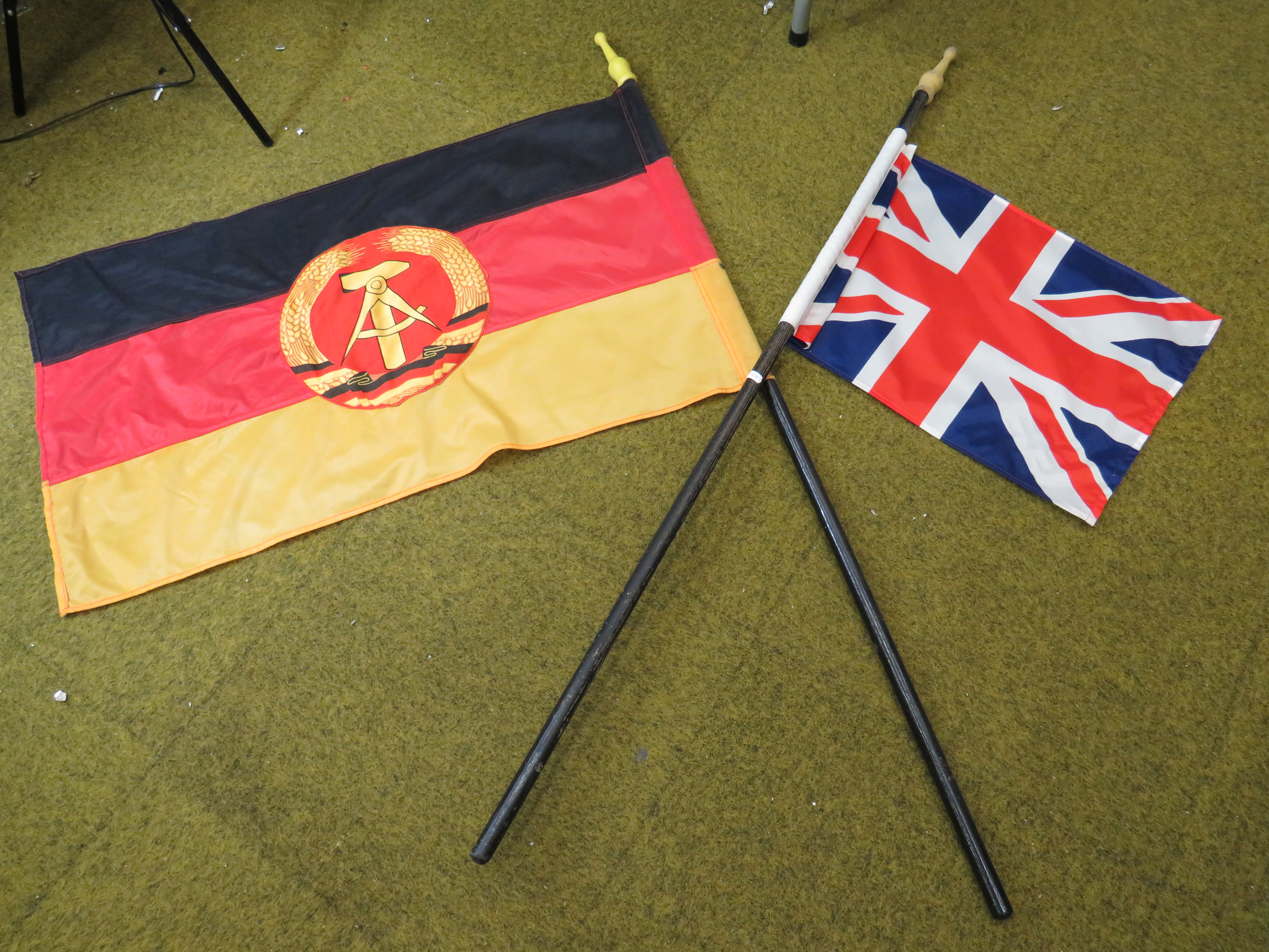 East German Flag with pole which measures approx 54 inches plus one other with Union Jack Flag. See 