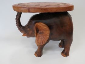 Hardwood Carved Elephant as an occasional table or stool . Measures approx 15 inches tall. See photo
